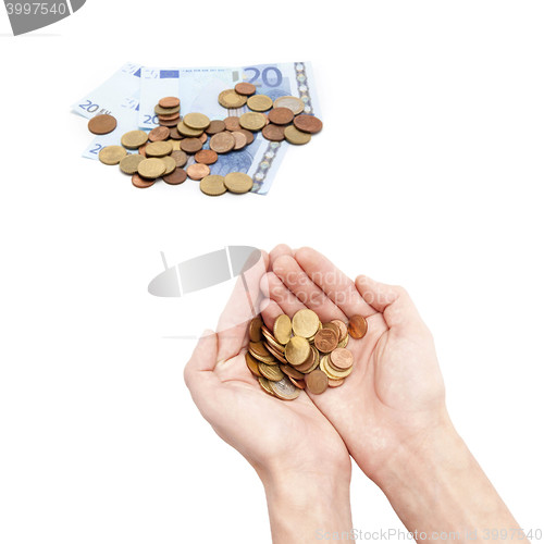 Image of Male hands holding coins isolated