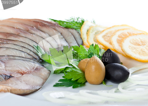 Image of sliced fish with vegetables