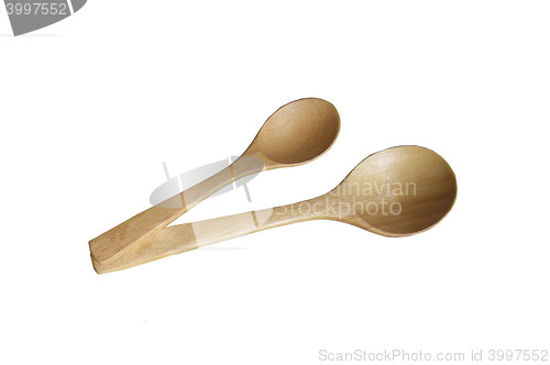 Image of New wooden spoon isolated on a white background.