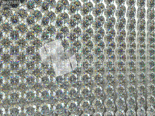 Image of Group of sparkling large diamonds or gemstones in rows