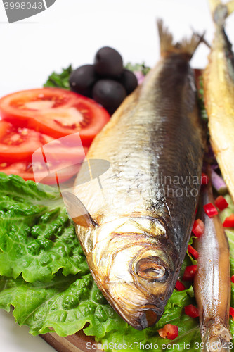 Image of fish with lemon on plate