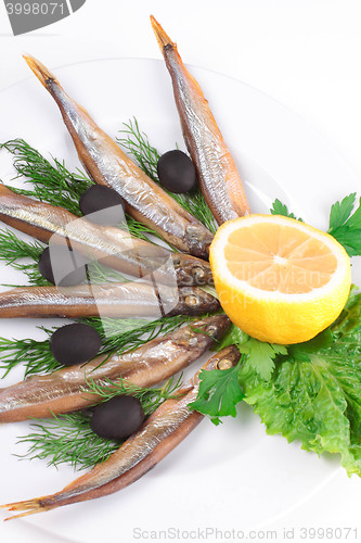 Image of kipper fish on composition with vegetables