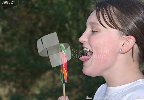 Image of teenager with lollipop
