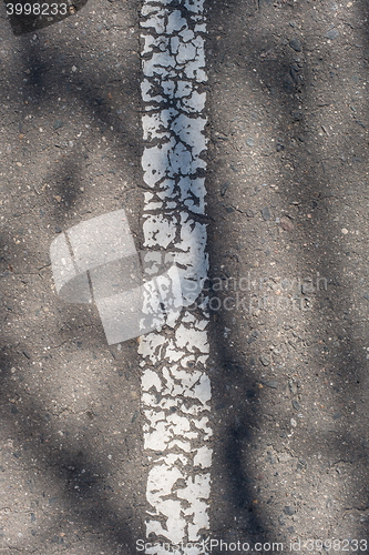 Image of Asphalt highway texture with cracked stripe