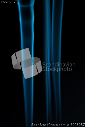 Image of Beautiful smoke on the black background - macro photo