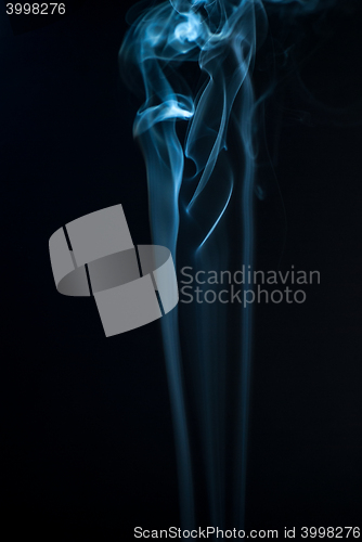 Image of Beautiful smoke on the black background - macro photo