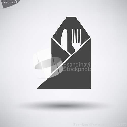 Image of Fork and knife wrapped napkin icon