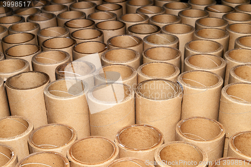 Image of Manufacturing background in the form of cardboard tubes