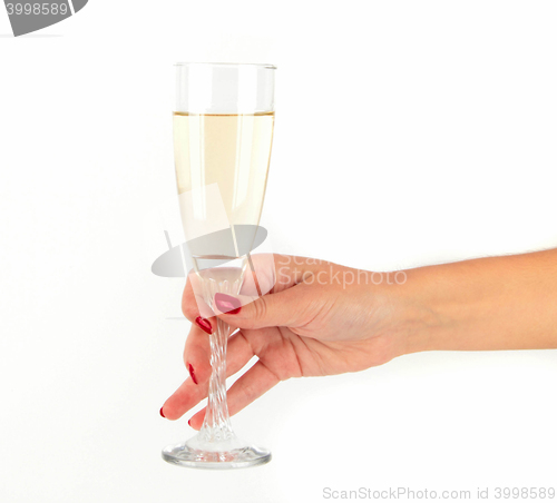 Image of women Hand holding glass of champagne