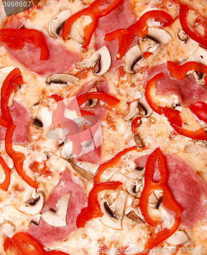 Image of pizza with tomato and meat background