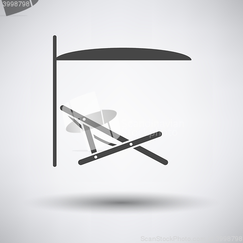 Image of Sea beach recliner with umbrella icon
