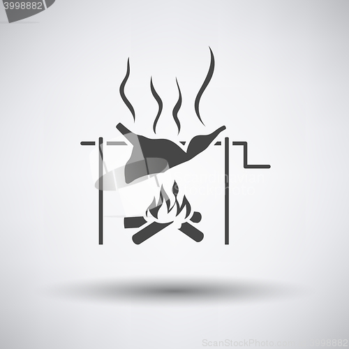 Image of Roasting meat on fire icon