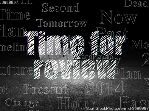 Image of Time concept: Time for Review in grunge dark room
