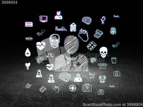 Image of Health concept: Doctor in grunge dark room