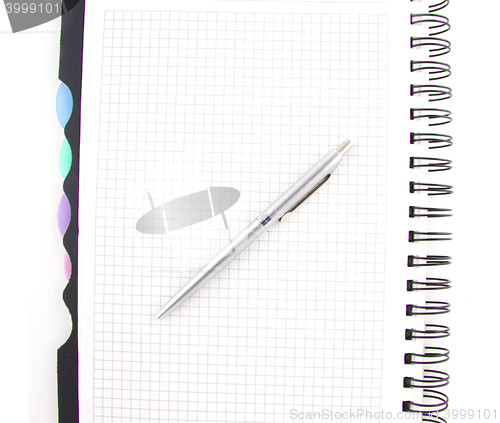 Image of black pen and notebook isolated
