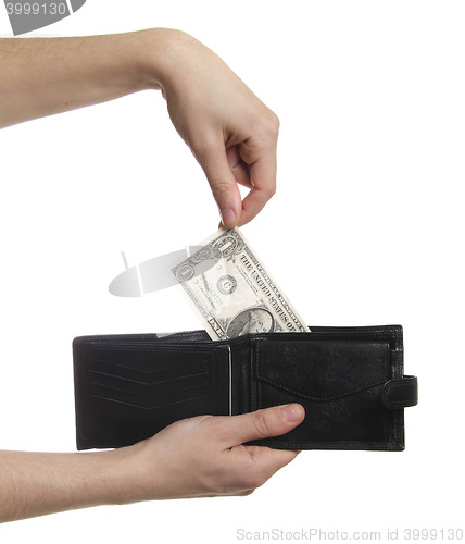Image of hand-pulling the dollar from purse isolaetd