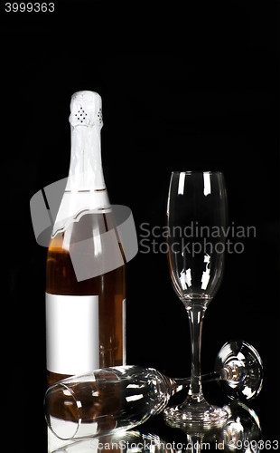 Image of Champagne - bottle and glass