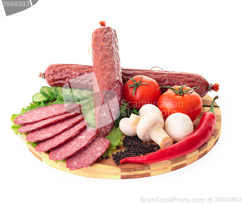 Image of sliced sausage with vegetables