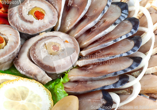 Image of various sliced fish