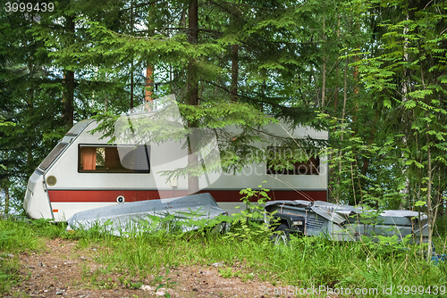 Image of Trailer in forest.