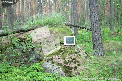 Image of Ubiquitous computer. Old monitor storm threw