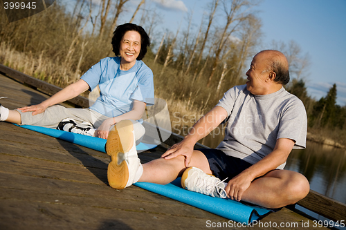 Image of Asian senior couple exercise