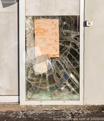 Image of Close up of a broken window