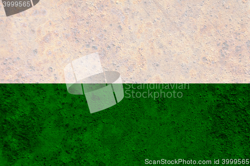 Image of Flag on rusty metal