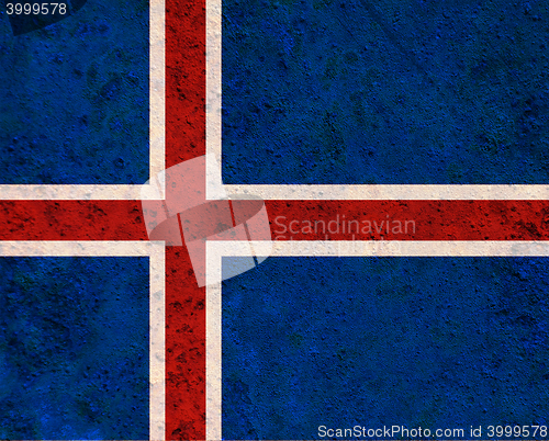 Image of Flag on rusty metal