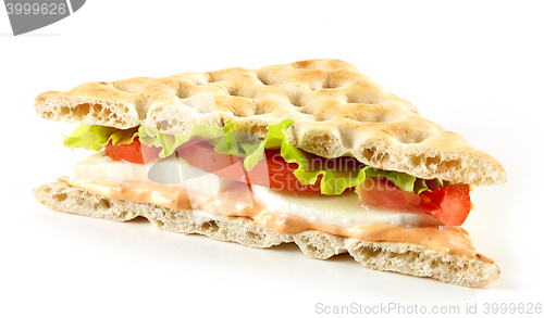 Image of sandwich with mozzarella and tomato