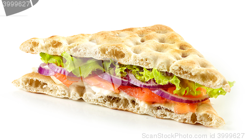Image of sandwich with smoked salmon and onions