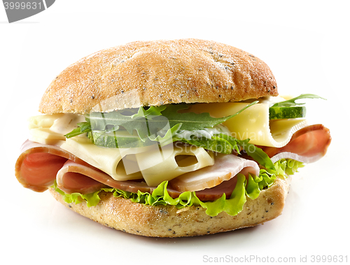 Image of sandwich with bacon, cheese and cucumber