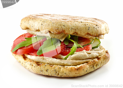 Image of sandwich with hummus and vegetables