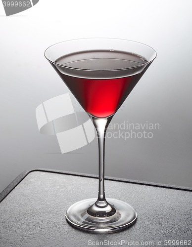 Image of glass of red cocktail