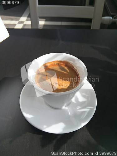 Image of coffee cup on table