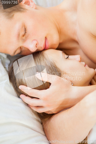 Image of Lifestyle. Beautiful couple in bed