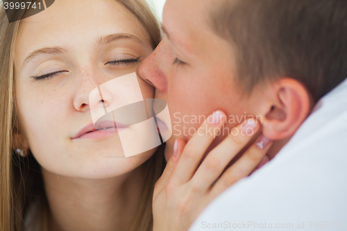 Image of Lifestyle. Beautiful couple in bed