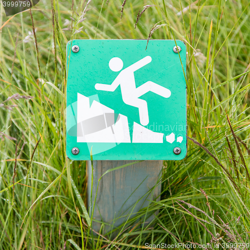 Image of Green square sign - Warning for risk of falling