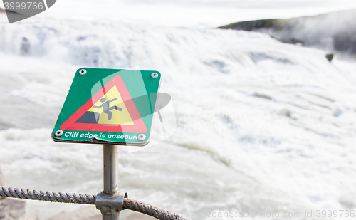 Image of Green square sign - Warning for risk of falling