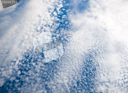 Image of flight above the clouds