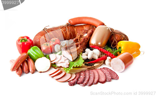 Image of sausages in coposition with vegetables