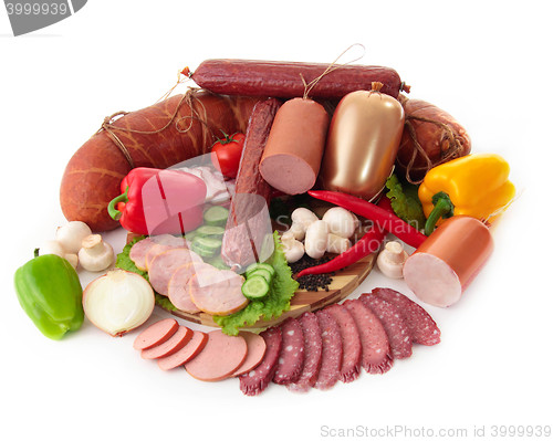 Image of sliced sausages with vegetables and red papper