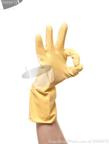 Image of hands in yellow gloves isolated on white