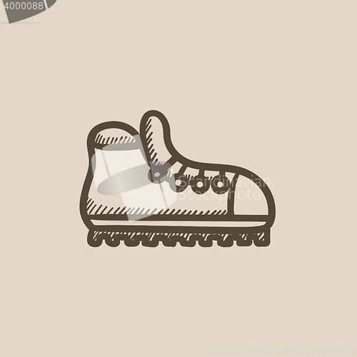 Image of Hiking boot with crampons sketch icon.