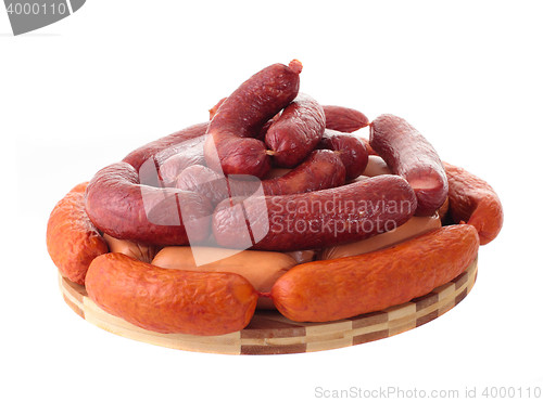 Image of delicious sausages on board