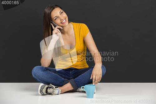 Image of Woman talking at phone