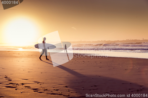 Image of Surfers on the beach