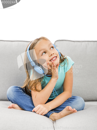 Image of Cute girl listen music
