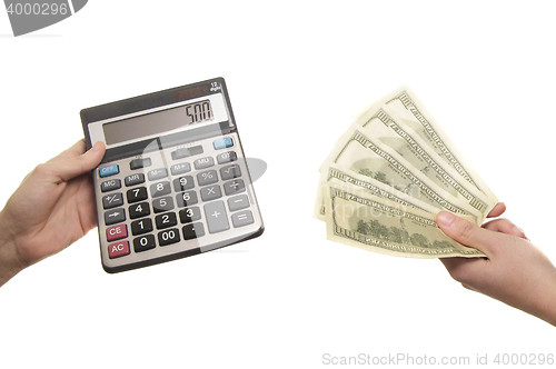Image of calculator and 500 dollars in hands