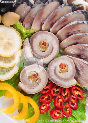 Image of fish with vegetables,anion red pepper